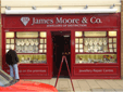 Illuminated stainless steel shop signage